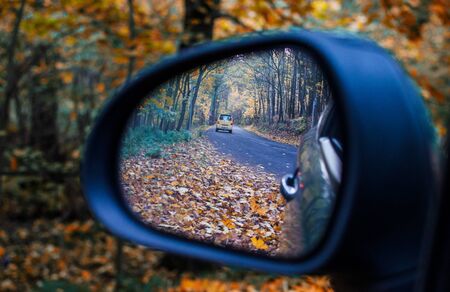 Colored autumn in the rearview mirror.の写真素材