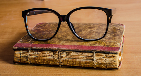 eyeglasses on the bookの写真素材