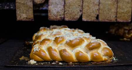 Freshly baked goldenfancy bread in a large bakery.