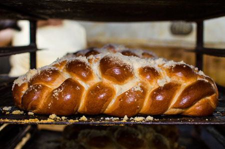 Freshly baked goldenfancy bread in a large bakery.