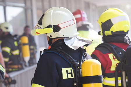 Firefighters intervening in a pernicious disaster or fire.