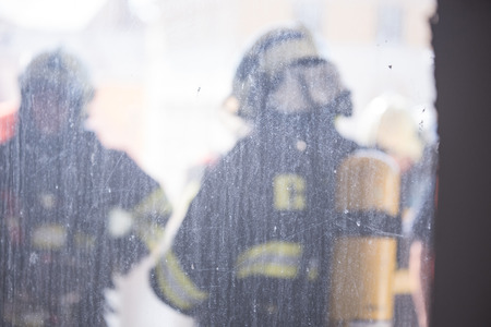 Firefighters intervening in a pernicious disaster or fire.の写真素材