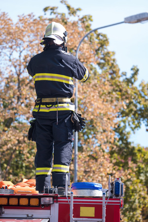 Firefighters intervening in a pernicious disaster or fire.