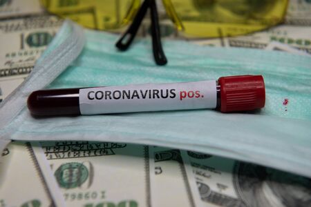 The economic situation of the world and the positive test at coronavirus.の写真素材