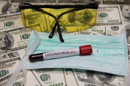 The economic situation of the world and the positive test at coronavirus.の写真素材