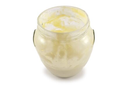 Bank with cream isolated on a white backgroundの写真素材