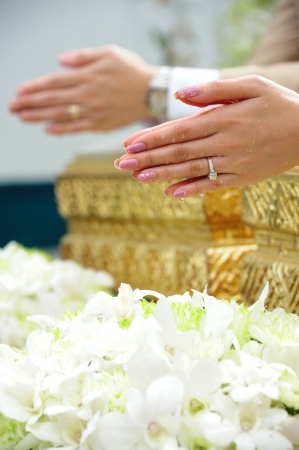 Blessed water at Thai wedding ceremony in Thailandの写真素材