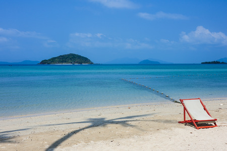 Chair on a beautiful tropical beachの写真素材