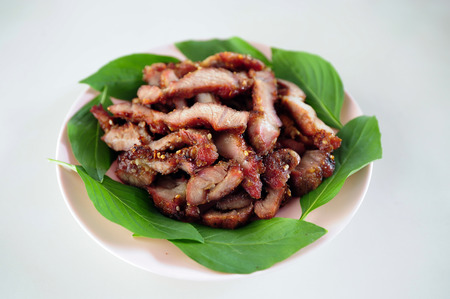 Grilled pork steak with spicy sauce, Thai food の写真素材