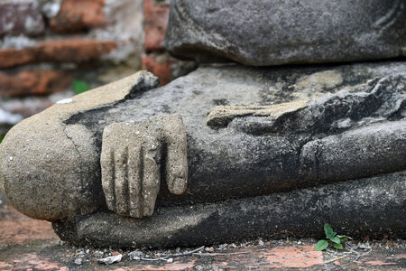 row of ruin buddha statue in wat chai wattanaram, ayutthaya, thailandの写真素材