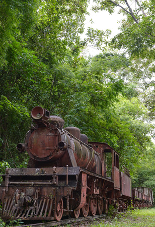 Rusty steam locomotive on WorldWar2 at Kanjanaburi Thailandのeditorial素材