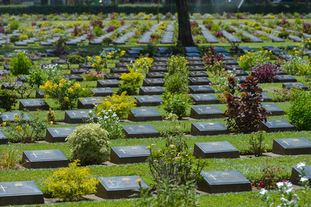 KANCHANABURI, THAILAND - SEPTEMBER 8 : Traveler foreigner visit Kanchanaburi War Cemetery (Don Rak) on September 8, 2014 in Kanchanaburi Thailand.のeditorial素材