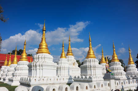 LAMPANG, THAILAND - NOVEMBER 18 : Golden Pagoda and Sculpture of the mythical god in temple Chedi Sao in Lampang, Thailand, November 18, 2014. Church was built in 15th centuryのeditorial素材