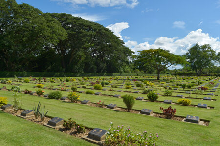 KANCHANABURI, THAILAND - SEPTEMBER 8 : Traveler foreigner visit Kanchanaburi War Cemetery (Chong Kai) on September 8, 2014 in Kanchanaburi Thailand.のeditorial素材