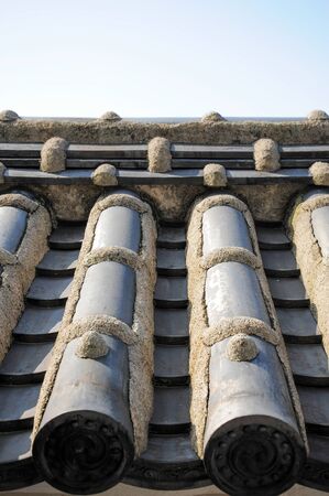 Detail of a japanese roofの写真素材