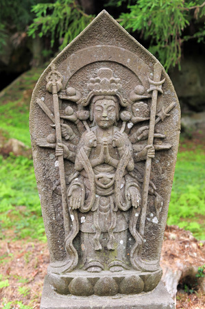 MATSUSHIMA, JAPAN - JULY 8, 2015 : Buddhist statue located along the entrance to the Zuiganji Temple in Matsushima. The area is considered one of the Three Most Scenic Spots in Miyagi District , Japanのeditorial素材