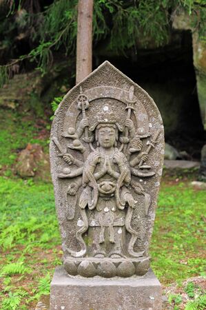 MATSUSHIMA, JAPAN - JULY 8, 2015 : Buddhist statue located along the entrance to the Zuiganji Temple in Matsushima. The area is considered one of the Three Most Scenic Spots in Miyagi District , Japanのeditorial素材