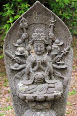 MATSUSHIMA, JAPAN - JULY 8, 2015 : Buddhist statue located along the entrance to the Zuiganji Temple in Matsushima. The area is considered one of the Three Most Scenic Spots in Miyagi District , Japanのeditorial素材