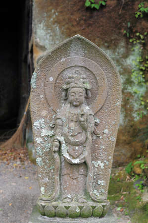 MATSUSHIMA, JAPAN - JULY 8, 2015 : Buddhist statue located along the entrance to the Zuiganji Temple in Matsushima. The area is considered one of the Three Most Scenic Spots in Miyagi District , Japanのeditorial素材