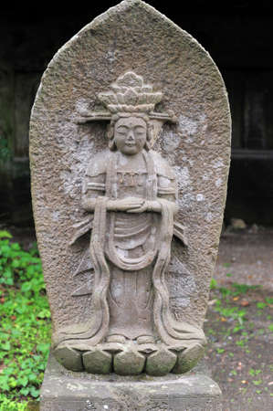 MATSUSHIMA, JAPAN - JULY 8, 2015 : Buddhist statue located along the entrance to the Zuiganji Temple in Matsushima. The area is considered one of the Three Most Scenic Spots in Miyagi District , Japanのeditorial素材