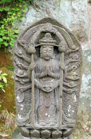MATSUSHIMA, JAPAN - JULY 8, 2015 : Buddhist statue located along the entrance to the Zuiganji Temple in Matsushima. The area is considered one of the Three Most Scenic Spots in Miyagi District , Japanのeditorial素材