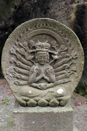 MATSUSHIMA, JAPAN - JULY 8, 2015 : Buddhist statue located along the entrance to the Zuiganji Temple in Matsushima. The area is considered one of the Three Most Scenic Spots in Miyagi District , Japanのeditorial素材
