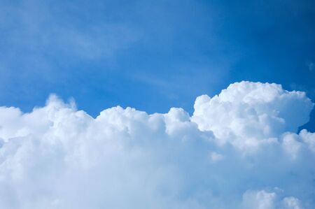 blue sky background with white cloudsの写真素材