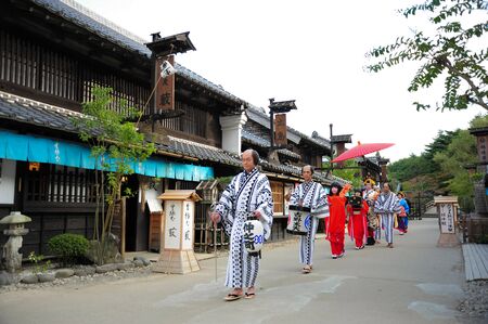 NIKKO, JAPAN - OCTOBER 6, 2015: Geisha parade at Edo Wonderland in Nikko Edomura Edo Wonderland is a history theme park recreating Japanese town life during the Edo Period 1603-1868.のeditorial素材