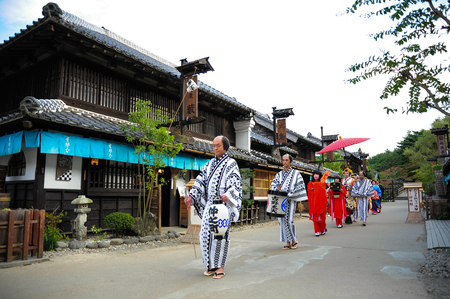 NIKKO, JAPAN - OCTOBER 6, 2015: Geisha parade at Edo Wonderland in Nikko Edomura Edo Wonderland is a history theme park recreating Japanese town life during the Edo Period 1603-1868.のeditorial素材
