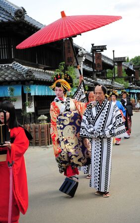 NIKKO, JAPAN - OCTOBER 6, 2015: Geisha parade at Edo Wonderland in Nikko Edomura Edo Wonderland is a history theme park recreating Japanese town life during the Edo Period 1603-1868.のeditorial素材