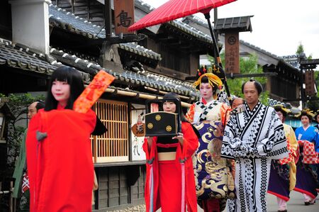 NIKKO, JAPAN - OCTOBER 6, 2015: Geisha parade at Edo Wonderland in Nikko Edomura Edo Wonderland is a history theme park recreating Japanese town life during the Edo Period 1603-1868.のeditorial素材