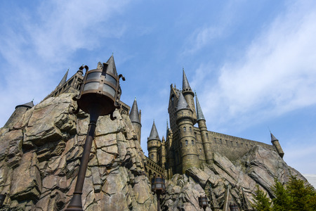 Osaka, Japan - MARCH 29 2016 : Hogwarts Castle in The Wizarding World of Harry Potter zone Universal Studios Theme Park in Osaka, Japan.のeditorial素材