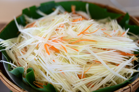 Raw papaya for papaya salad or som tumの写真素材
