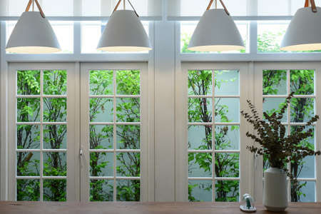 Interior of a modern window in white decor with a comfortable.の写真素材