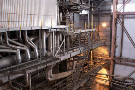 Equipment, cables and piping as found inside of a modern industrial power plant.の写真素材