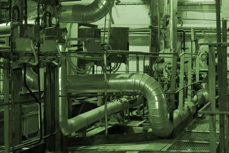 Equipment, cables and piping as found inside of a modern industrial power plant          の写真素材