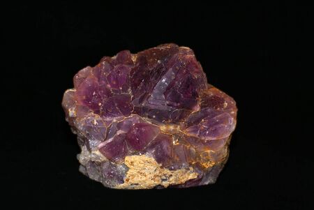 natural amethyst crystallized structure on black background            