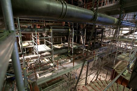 Pipes, tubes, machinery and steam turbine at a power plant               