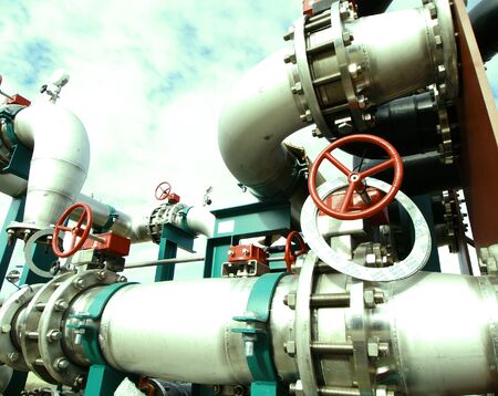 Industrial zone, Steel pipelines and cables in green tonesの写真素材