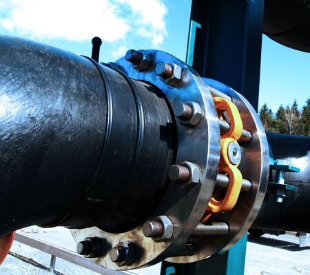 Industrial zone, Steel pipelines and cables in blue tonesの写真素材