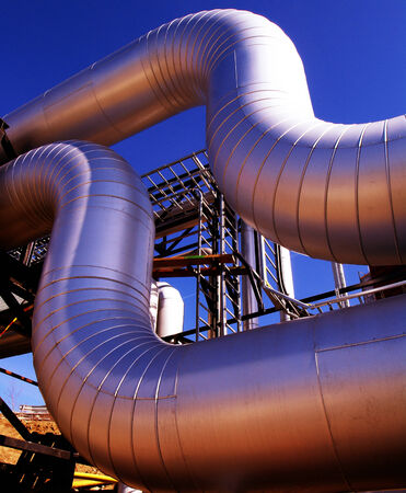 Industrial zone, Steel pipelines at sunset
        の写真素材