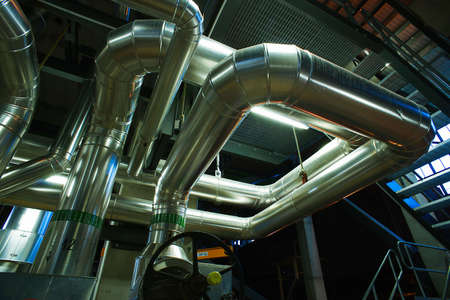 Equipment, cables and piping as found inside of a modern industrial power plantのeditorial素材