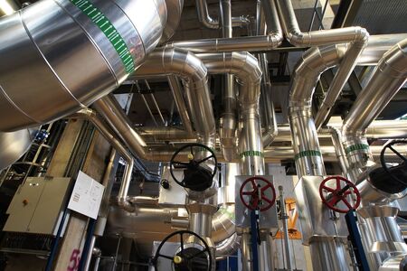 Equipment, cables and piping as found inside of a modern industrial power plantのeditorial素材