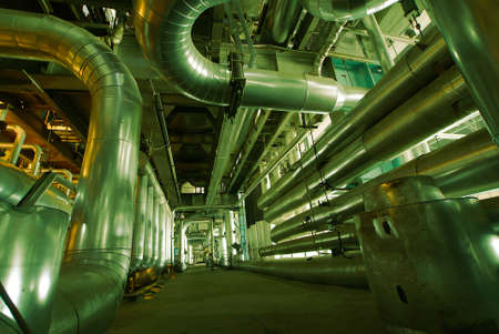 different size and shaped pipes and valves at a power plant