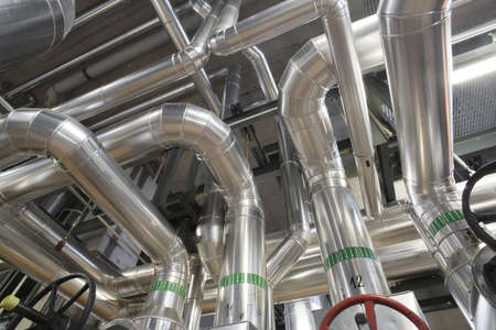 Equipment, cables and piping as found inside of a modern industrial power plantのeditorial素材