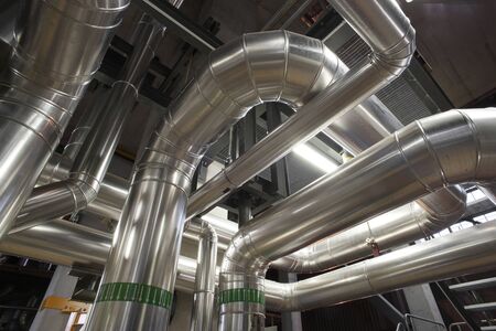 Equipment, cables and piping as found inside of a modern industrial power plantのeditorial素材