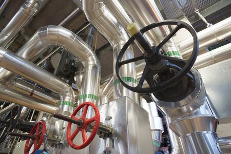 Equipment, cables and piping as found inside of a modern industrial power plantのeditorial素材
