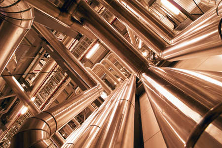 Equipment, cables and piping as found inside of a modern industrial power plantの写真素材