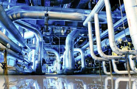 Industrial zone, Steel pipelines in blue tones with reflection