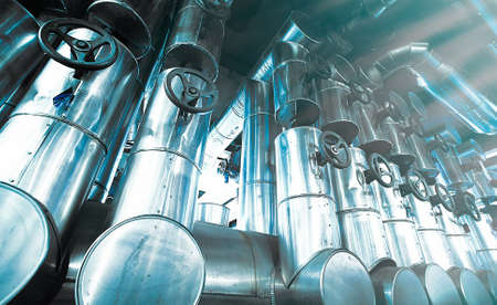 Industrial zone, Steel pipelines and cables in blue tonesの写真素材